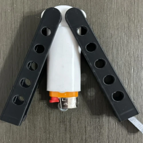 The FlipFlick: Balisong Butterfly Mini Bic Lighter Sleeve
